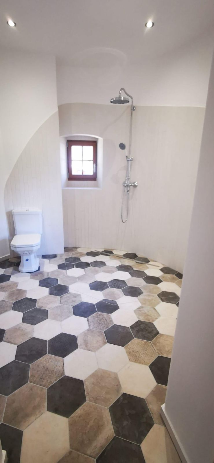 Après : Transformation d'une pièce en salle d'eau à Nyon